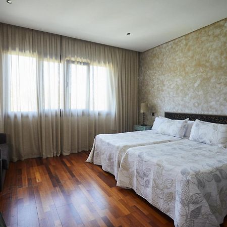 Hotel El Mirlo Blanco 坎德莱达 外观 照片