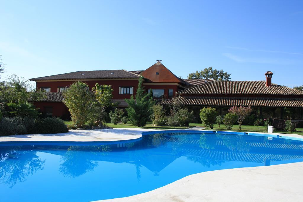 Hotel El Mirlo Blanco 坎德莱达 外观 照片